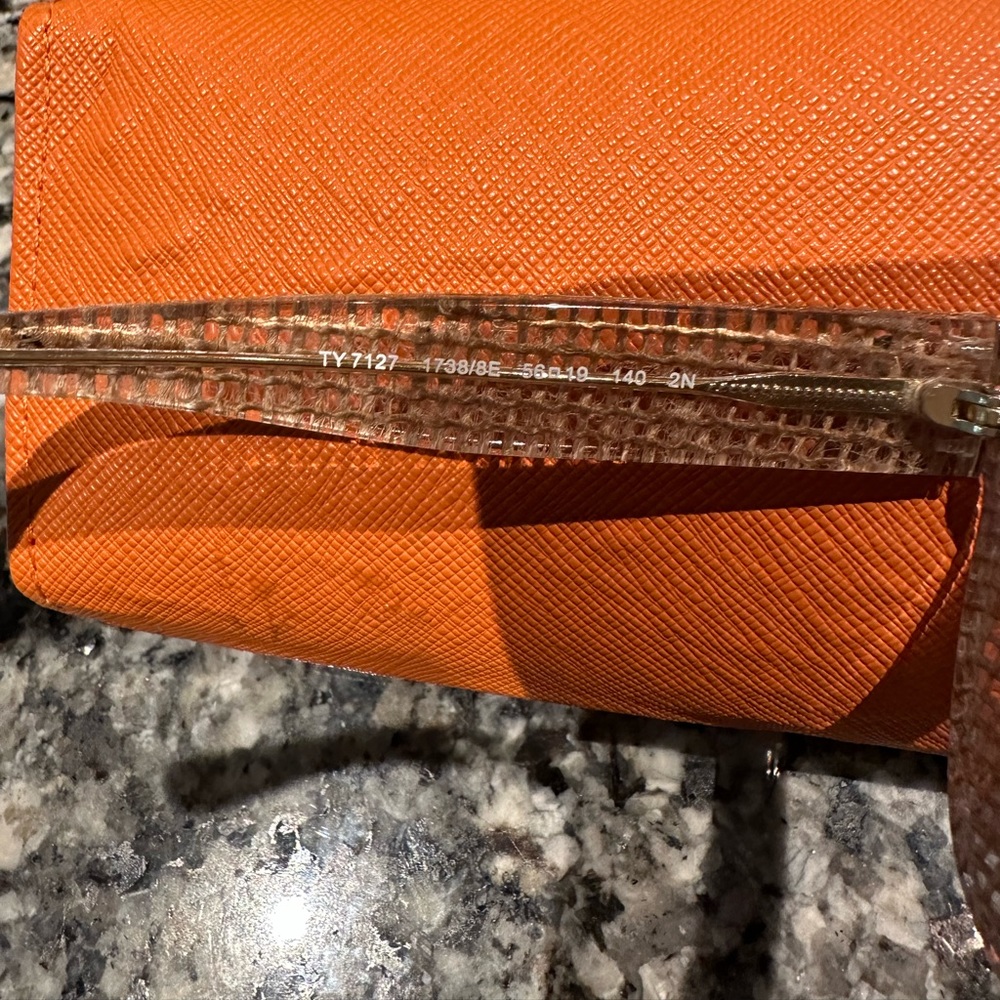 Tory Burch 56mm Sunglasses Case is a little compromised from direct Sun in car.